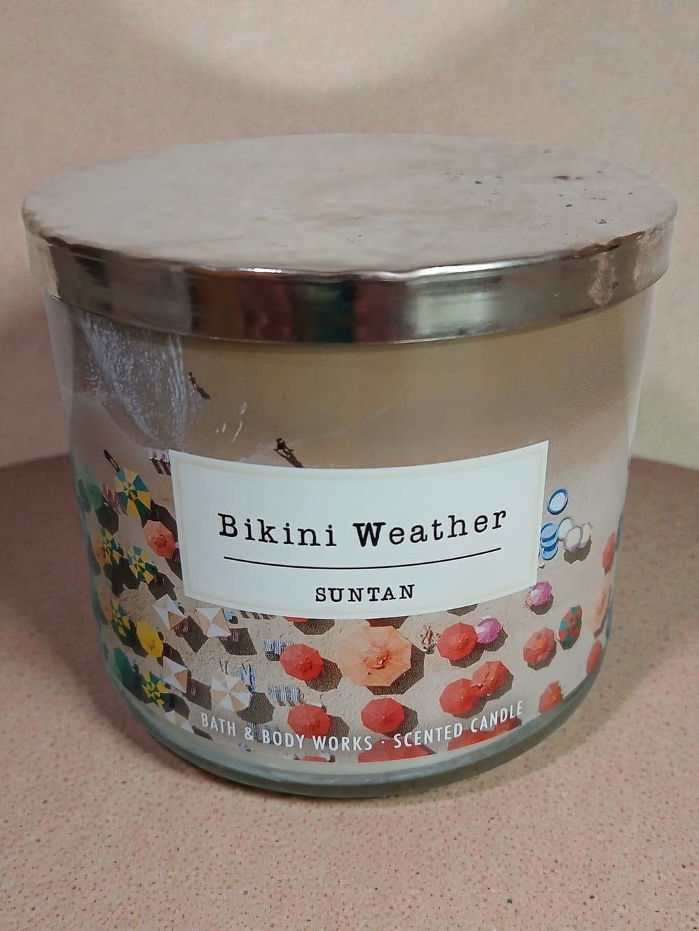 Bath & Body Works Bikini Weather Suntan Candle - White with Multicolor Umbrellas